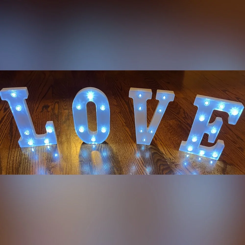 8.3in tall light up LED L.O.V.E letters. Batteries included.
